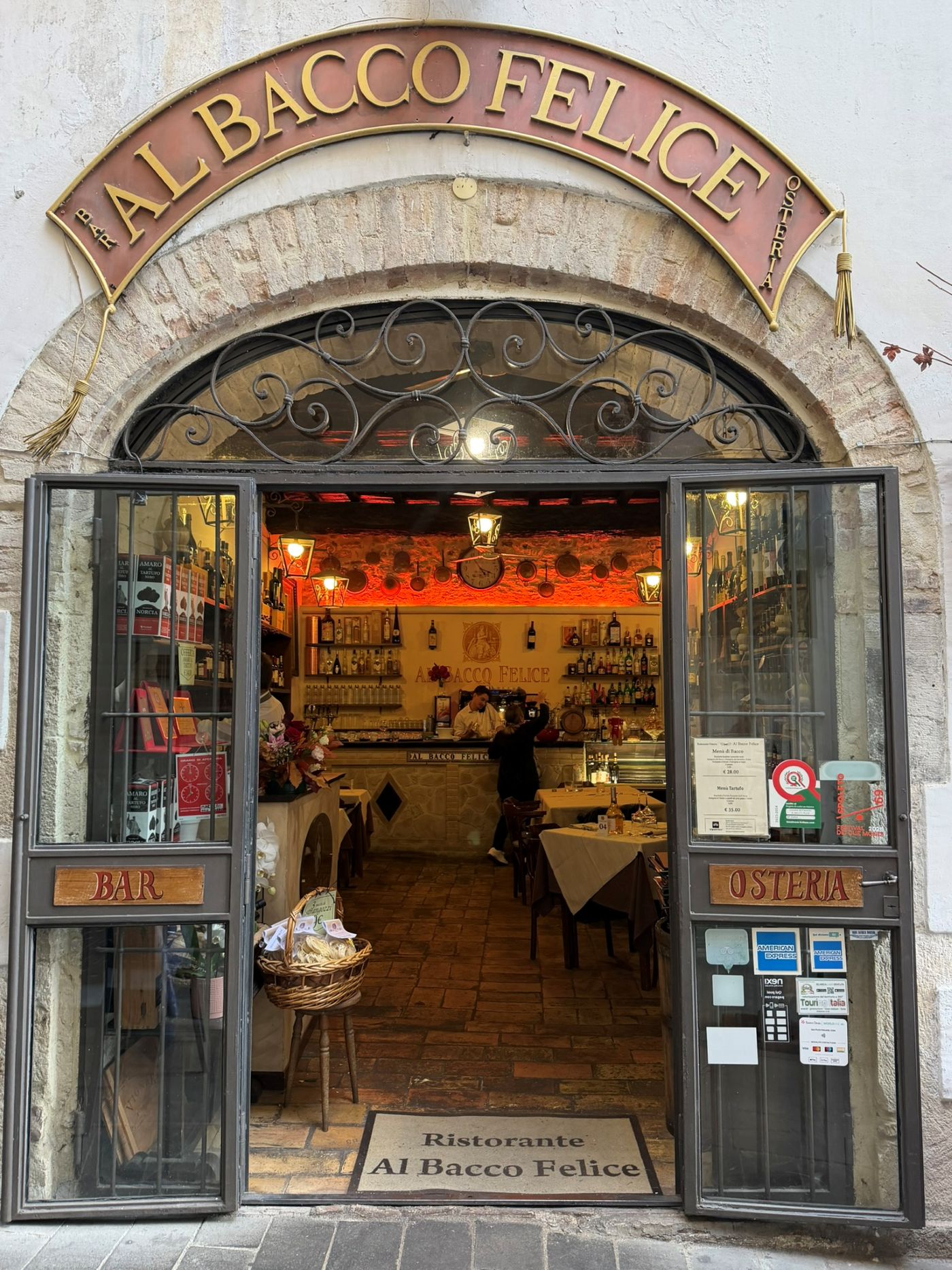 The open doorway of Al Bacco Felice, a restaurant in Spoleto